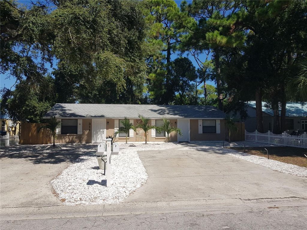 Photo of 311 58th Avenue E, Bradenton, FL 34203 (MLS # A4675844)