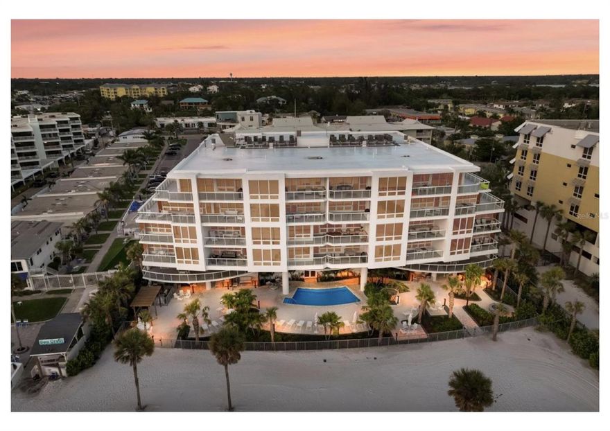 Luxury Gulf-Front Living on South Siesta Key- Discover the ultimate coastal retreat in this stunning Gulf-front condo, perfectly positioned along the pristine shores of Siesta Key. Offering unmatched beach access, this 2-bedroom, 2.5-bathroom residence blends contemporary beachfront elegance with modern comfort. Step inside to an expansive open floor plan featuring a gourmet kitchen equipped with premium appliances, a wine fridge, and designer accents. The kitchen flows seamlessly into the spacious dining and living area, which opens onto a private terrace—the perfect spot to soak in breathtaking Gulf views. The primary suite is a true sanctuary, complete with a large walk-in closet and an en-suite bath boasting dual vanities, a private water closet, and a walk-in shower. The additional bedroom, featuring built-in bunk beds and an en-suite bath, offers both space and style—ideal for families or guests. Whether you seek a primary residence, a vacation getaway, or an income-producing rental, this exceptional property delivers. Residents enjoy access to a beachfront swimming pool and spa, private cabanas with beachside service, and a Gulf-front BBQ grilling area perfect for entertaining. Complimentary kayaks and paddleboards are available for exploring the water, while the onsite concierge arranges additional activities and excursions. A state-of-the-art fitness center ensures residents can stay active, and on-site management provides added convenience. With a perfect blend of luxury, comfort, and effortless beachfront living, Ten35 Seaside offers an unparalleled lifestyle. Don't miss this rare opportunity to own a piece of Siesta Key paradise—schedule your private tour today!