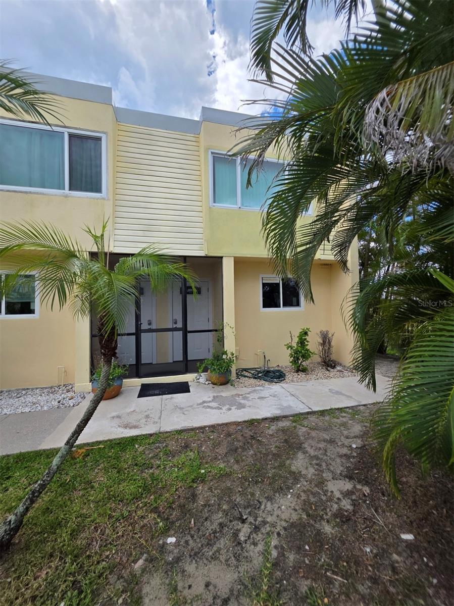 Experience coastal living in this 2-bedroom, 1.5-bathroom end unit condo in Punta Gorda’s Charlotte Bay Villas. This home offers a partial waterview and is steps from Fishermen’s Village. The open living/dining area flows into a modern kitchen with ample cabinetry. Enjoy a private lanai with water glimpses, plus the perks of an end unit with extra light and privacy. HOA covers maintenance, insurance, water, and more.