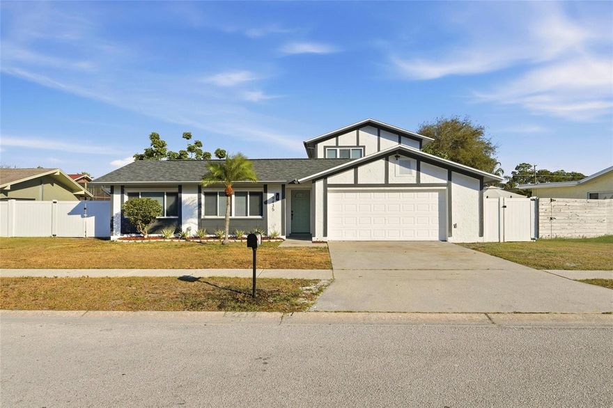 Beautifully Updated Sanctuary in Seminole Grove Estates! Discover this stunning 4 bedroom, 3 bath pool home offering the perfect blend of style and comfort. This move in ready oasis features a brand new roof, luxury vinyl plank flooring, fresh interior and exterior paint, and a refinished pool with an upgraded paver deck, ideal for relaxing or entertaining. Inside, you’ll find a thoughtfully updated interior with a beautifully redesigned kitchen and baths. The custom kitchen shines with modern shaker cabinetry, quartz countertops, and new upgraded stainless-steel appliances, creating a sleek and functional space at the heart of the home. Conveniently located close to Seminole City Center, dining, parks, beaches, and major highways and is zoned for top rated schools.  Family room photo is virtually staged