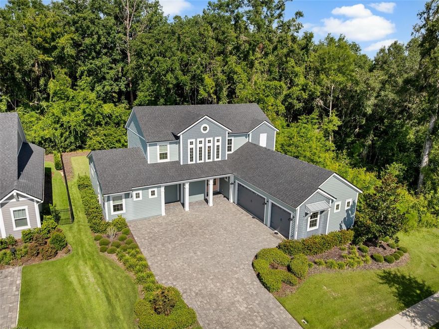 Experience modern elegance and timeless harmony with the Marbella Floor Plan, offering 4 bedrooms, 4.5 bathrooms, and a dedicated office, nestled in the highly sought-after community of Oakmont. This exquisite home is thoughtfully positioned on a premium corner lot, backing to lush conservation land with no neighbors to the right or behind—providing unmatched privacy and serenity. A standout feature of this home is its east-facing main entrance, which welcomes the morning sun and bathes the central living areas in natural light. At the heart of the residence lies a stunning open-concept kitchen, living, and dining area. Expansive glass windows frame breathtaking views of the private backyard and tranquil conservation area, while flooding the space with warm, natural light. Just beyond the study, the luxurious master suite offers a peaceful retreat with an oversized walk-in closet and a spa-like bathroom. Upstairs, the layout is ideal for family and guests, featuring two private guest bedrooms with ensuite bathrooms, a versatile loft or second living area, and a third bedroom/office with an additional full bath. Whether hosting gatherings or enjoying quiet moments, every space is designed to embrace light, comfort, and connection to nature. Additional highlights include a ground-floor half bath, massive under-the-stairs storage, a screened-in pavered back porch perfect for peaceful evenings, an oversized pantry, a 3-car garage with a Tesla charger, and a lot spacious enough to accommodate a future pool. This home is a rare blend of modern design, and natural beauty—offering not just a place to live, but a lifestyle to be cherished. Don’t miss the opportunity to make this exceptional property your own. Step into your future dream home in Oakmont’s resort-style community. Owner is open to Owner financing.