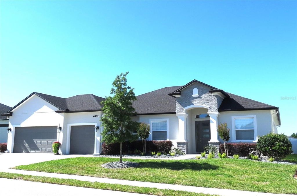 Photo of 6990 Bentridge Drive, Lakeland, FL 33813 (MLS # O6400452)