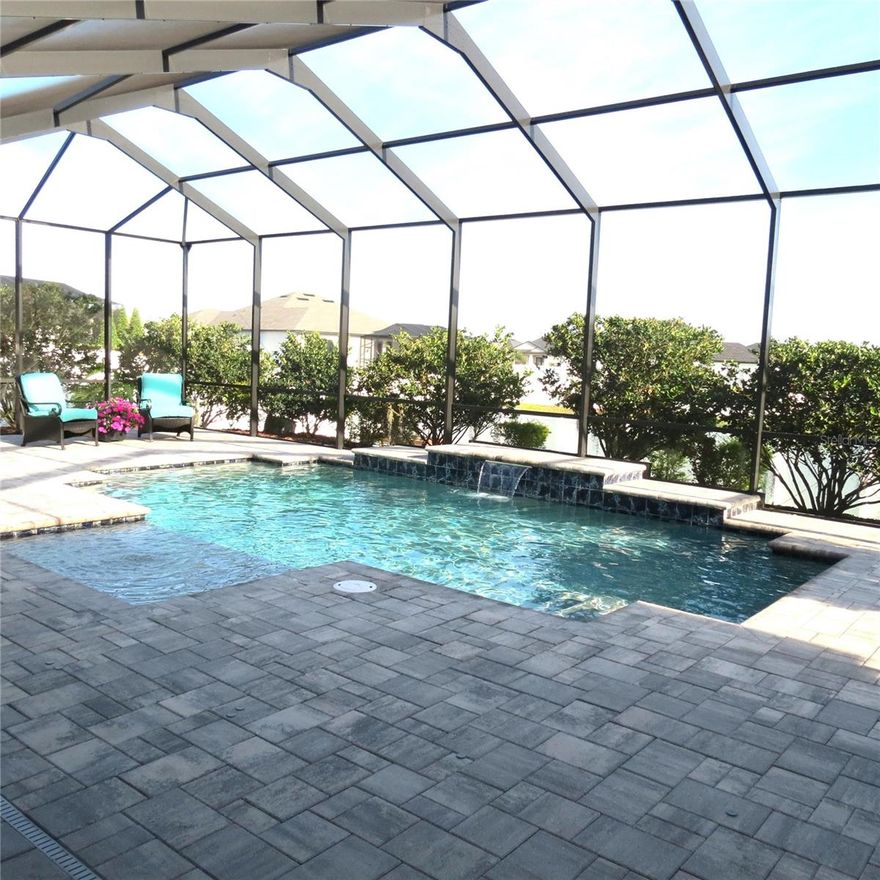 Better than new! This modern 2023 Tapia single-level home has an open, spacious, split floor plan with 2440 square feet that is located in the desirable Treymont gated community. Step inside this home with high ceilings where the living, dining, kitchen and lanai flow seamlessly. Less than 12 minutes from the new Orlando Health Hospital, shopping and walking trails.

Kitchen: The gourmet, eat-in kitchen offers a large granite island with storage and seating, white cabinets and subway tile, a spacious walk-in pantry, upgraded stainless appliances, soft-close oversized cabinets and drawers and under cabinet lighting. The gourmet kitchen opens to an expansive family room. 

Family Room: The expansive family room features a beautiful stone fireplace wall, shelving and three glass-panel sliding doors that opens to the large lanai enclosing a beautiful salt-water pool surrounded by mature landscaping for beauty and privacy. 

Flex Space: The formal dining/office/playroom/flex space with glass French doors offers endless possibilities.

Primary Suite: The expansive primary suite features a door accessible to the lanai and a luxurious 5-piece bath. The bath includes a large fully-tiled shower, a soaking tub, a large double vanity with a cabinet tower which includes electrical and a spacious large walk-in closet with plenty of storage. 

Split Floor Plan with 3 additional Bedrooms: The floor plan features an additional three spacious bedrooms strategically place on the other side of the home for privacy, all with ceiling fans and one ensuite with access to the lanai with a gorgeous salt-water pool. 

Garage: The oversized, epoxy  garage floor provides overhead storage and will fit a full-size truck and refrigerator/freezer/workbench. 

Lanai & Pool: The large screened lanai with ceiling fans and a television hook-up encloses a salt-water pool with a safety fence. The pool water features provide a relaxing, trickling sound and the shelf with a bubbler is perfect for sitting and cooling off. 

Backyard: Enjoy the backyard’s exquisite mature landscaping with landscape lighting which creates a resort-like feel to enjoy day and night. The backyard also features morning sun and afternoon shade, a raised garden bed and is fully fenced for privacy and pets. 

Excellent school district! There’s so much more…too much to list!