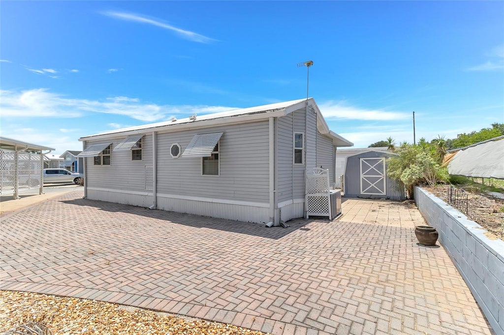 Photo of 300 Sky Crest Loop, Davenport, FL 33837 (MLS # O6439551)
