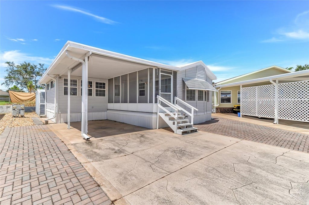 Photo of 300 Sky Crest Loop, Davenport, FL 33837 (MLS # O6439551)