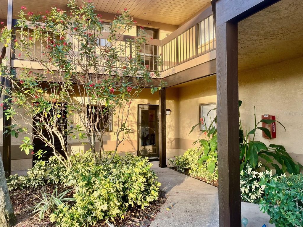 Photo of 2663 Sabal Springs Circle #102, Clearwater, FL 33761 (MLS # TB8463211)