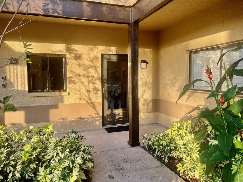 Photo of 2663 Sabal Springs Circle #102, Clearwater, FL 33761 (MLS # TB8463211)