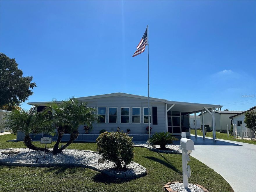 Beautifully renovated 2-bedroom, 2-bath doublewide home located in the award-winning 55+ community of Harbor Isles in North Port, FL. This home features an air-conditioned Florida room, screened porch, and a private outdoor patio perfect for relaxing or entertaining. Offering a limited side view of the lake. Inside, many walls are finished with sheetrock for a modern look. The home has hurricane-rated windows, and the living and dining room windows provide amazing natural light and allow for great airflow on cooler days and nights. The kitchen features custom cabinetry with under-cabinet lighting and a bright, open layout ideal for gatherings. An oversized storage shed provides plenty of extra space, and the beautifully landscaped island on the street enhances the curb appeal. Enjoy resort-style living with community pools, clubhouse, marina, fitness center, and a full calendar of social activities—all just minutes from shopping, dining, and Gulf beaches.