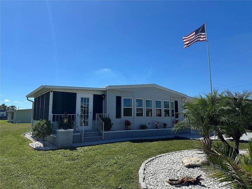 Beautifully renovated 2-bedroom, 2-bath doublewide home located in the award-winning 55+ community of Harbor Isles in North Port, FL. This home features an air-conditioned Florida room, screened porch, and a private outdoor patio perfect for relaxing or entertaining. Offering a limited side view of the lake. Inside, many walls are finished with sheetrock for a modern look. The home has hurricane-rated windows, and the living and dining room windows provide amazing natural light and allow for great airflow on cooler days and nights. The kitchen features custom cabinetry with under-cabinet lighting and a bright, open layout ideal for gatherings. An oversized storage shed provides plenty of extra space, and the beautifully landscaped island on the street enhances the curb appeal. Enjoy resort-style living with community pools, clubhouse, marina, fitness center, and a full calendar of social activities—all just minutes from shopping, dining, and Gulf beaches.