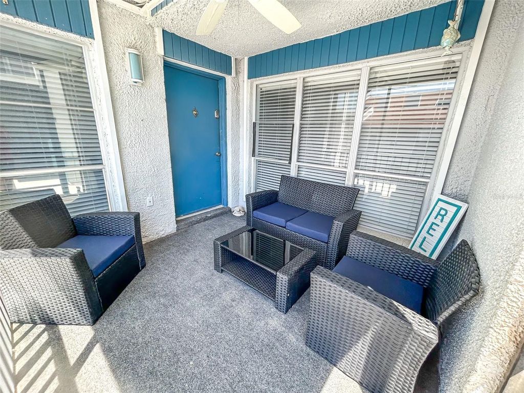 Photo of 315 Medallion Boulevard #F, Madeira Beach, FL 33708 (MLS # O6335780)