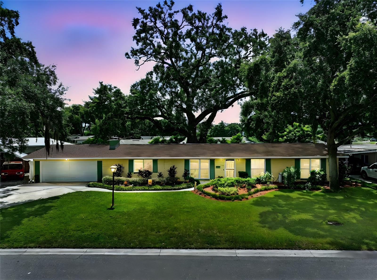 Welcome to 3630 Pershing Avenue, where the charm of “Old Florida” meets the function and form of modern-day living. Built in a time when craftsmanship was both sound and thoughtful, this home was built around a towering 200-year-old Oak tree, ensuring that nature and man would live in harmony on this property for years to come. Complete with a greenhouse and squirrel playground, this beautiful, private backyard is a sanctuary for anyone seeking a little time away from the hustle of life and craving time in nature.
The inside of this charming home has sweet surprises around every corner, from a starry lit kitchen to pull out pantry cabinets, copious amount of storage and a brand new 12x30 screened in patio. With a living room so stunning that it could request an address of its own, it offers undeniable character and is clearly the heart of this home. Proudly positioned along a brick lined wall, this wood burning, Chicago brick fireplace will warm both the heart and home. A place for family to gather and relax, making memories, season after season.
Bright and adaptable, all three bedrooms are ready to meet your needs, whether for guests, creativity or rest. The master bath proudly preserves its mid-century soul, bringing a vintage pop of history with its blue tile, while the guest bathroom offers a nod to nature with its leafy patterns and natural tones, giving it a peaceful, garden-inspired atmosphere.
3630 Pershing Ave holds a charm that only can be appreciated when walking through its doors. Sweetening the experience with a new roof (2024), hot water heater (2020), AC (2020), appliances (2020), blinds (2020), whole house water softener (2023) and a screened in patio (2022).
From its coveted location to its alluring charm, this home is a must-see.