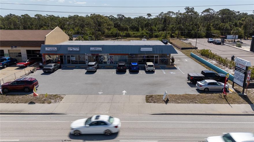 FULLY LEASED FIVE UNIT STRIP PLAZA.  This 6000 SF plaza has a new roof, parking lot and a new sign on busy SR776.  Located 200 feet from the intersection of Historic Dearborn Street and Indiana Ave this property has great traffic counts and exposure and is sure to appreciate for years to come thanks to its fantastic location.  Three units are leased month to month and the double unit on the end has just signed a new six year lease.  This one acre parcel has room to expand for additional income opportunities and has all the utilities available and desirable X flood zone for cost effective expansion.  If you are looking for a new home for your current business or just shopping for a safe haven with income, this property presents a unique opportunity.  Seller financing is being offered to well qualified buyers.