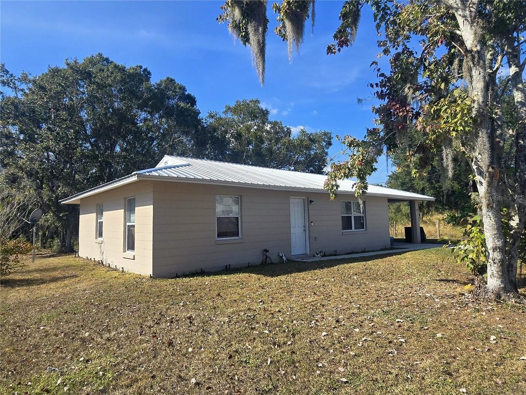 Photo of 4827 Myrick Avenue, Bowling Green, FL 33834 (MLS # A4672802)