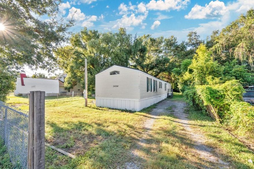 Affordable 3-Bedroom Home on Owned Land!
This 1997 manufactured home offers 1,216 sq. ft. of comfortable living space on its own lot—no lot rent! Enjoy a spacious, open floor plan featuring a large living room and kitchen, perfect for gatherings or everyday living. Major updates have already been completed, including a new roof (2019), new septic system (2020), and new A/C (2022).
The property also includes a 24 ft x 24 ft concrete block building, partially finished and full of potential—ideal for a workshop, storage, or future guest space. With some cosmetic updates, this home can truly shine! Whether you’re looking for a smart investment opportunity or a starter home, this one checks all the boxes.