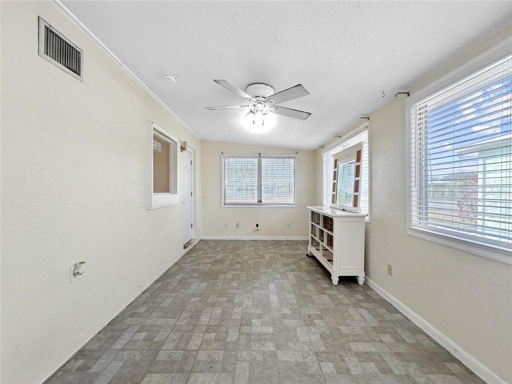 Photo of 404 Dunn Drive NE, Port Charlotte, FL 33952 (MLS # O6362017)