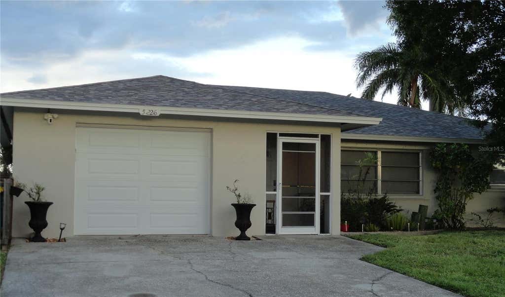 Photo of 5226 Neville Terrace, Port Charlotte, FL 33981 (MLS # C7528697)