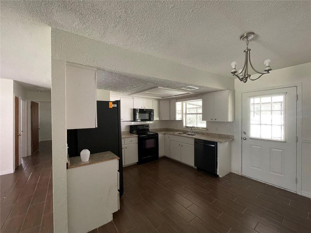 Photo of 9875 W Orchard Street, Crystal River, FL 34428 (MLS # OM718937)