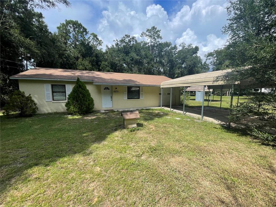 This two-bedroom, two-bathroom home sits on nearly an acre of land (0.92 acres) in the heart of the Nature Coast. Ready for your personal touch, the property features a 2015 roof, a one-car garage, and new tile flooring throughout. The home includes a large screen-enclosed porch overlooking a spacious backyard, great for outdoor dining. Additional features include a storage shed/workshop and two detached carports for ample exterior coverage. Conveniently located just around the corner from Citrus Way, you are minutes from Kings Bay Park in Crystal River, as well as local restaurants, shopping, and medical facilities. The area offers numerous docks and marinas for easy access to the Bay and the Gulf. Additionally, the property is a short drive from Suncoast 589, providing a quick route to St. Petersburg and the greater Tampa Bay area. This property did NOT sustain any flooding or damage from the recent hurricanes in 2025. Please call today to schedule a viewing before this opportunity is gone. 
Close