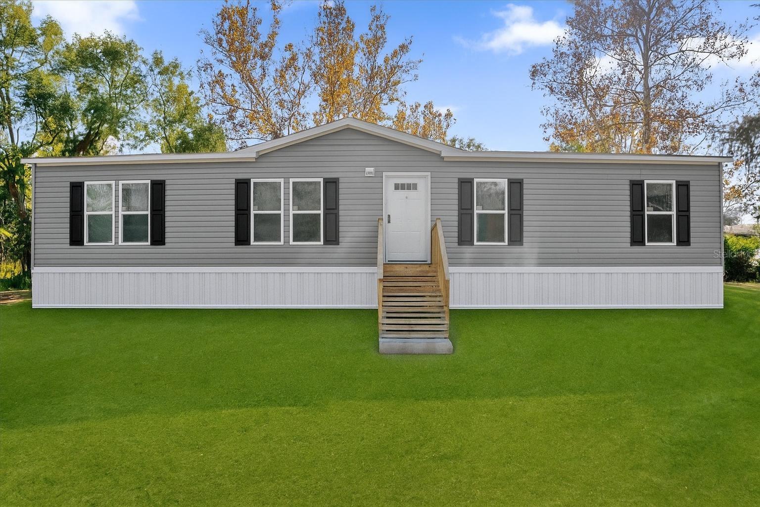 Under Construction. Be the first to own this brand-new manufactured home, currently under construction and designed with modern living in mind! Set on over half an acre in a quiet, well-established neighborhood, this home offers the perfect blend of comfort, space, and tranquility. Featuring a spacious open-concept layout, energy-efficient systems, and stylish finishes throughout. Enjoy a contemporary kitchen with new appliances, a generous primary suite with walk-in closet, and quality craftsmanship from top to bottom. A rare opportunity to own a new home in such a peaceful setting—don’t miss your chance to make it yours!