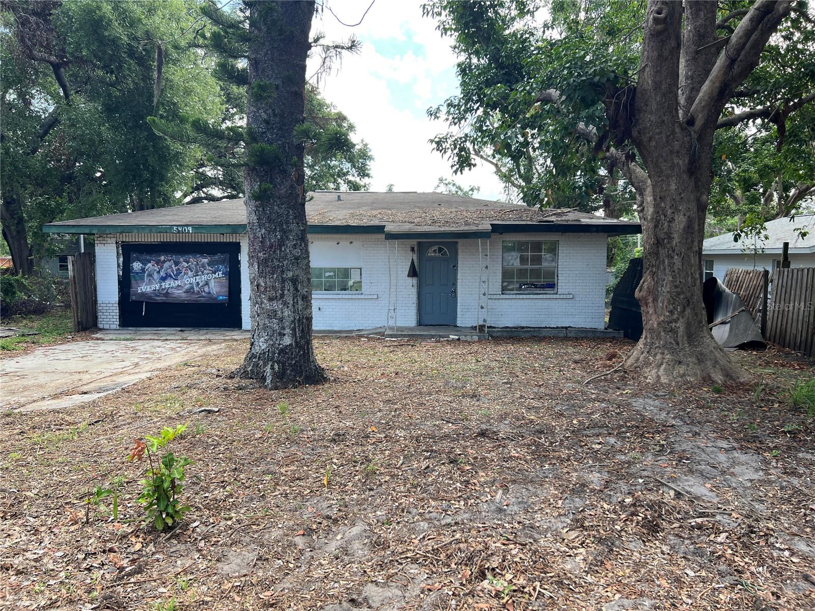 ALL OFFERS CONSIDERED! NEW METAL ROOF has been contracted for install. Discover the potential in this centrally located, 1072 SF under-roof, 2-bedroom, 2-bath home nestled on a quiet dead-end street in Bradenton. Just minutes from downtown Bradenton, I-75, and Sarasota, this property offers unbeatable convenience with room to add value. Originally a 2-bedroom, 1-bath home, the garage may be converted into additional living space, and a second bathroom has been added (permitted status unknown, buyer to verify). The flexible layout provides numerous renovation options. This property needs work and is ideal for owner-occupants looking to rehab and build instant equity. Sold as-is. Bring your toolbox and imagination—the possibilities are endless. Seller may provide hard money financing to qualified buyers.