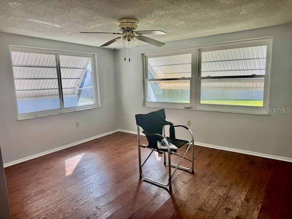 Photo of 9617 Lake Chrise Lane, Port Richey, FL 34668 (MLS # W7881892)