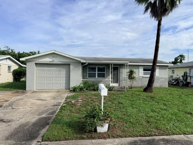 Photo of 7323 Oak Crest Drive, Port Richey, FL 34668 (MLS # W7890226)