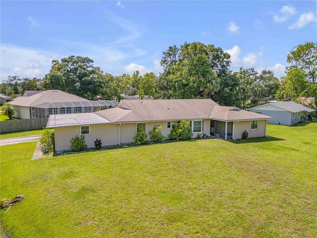 Photo of 2430 Unity Tree Drive, Edgewater, FL 32141 (MLS # NS1087250)
