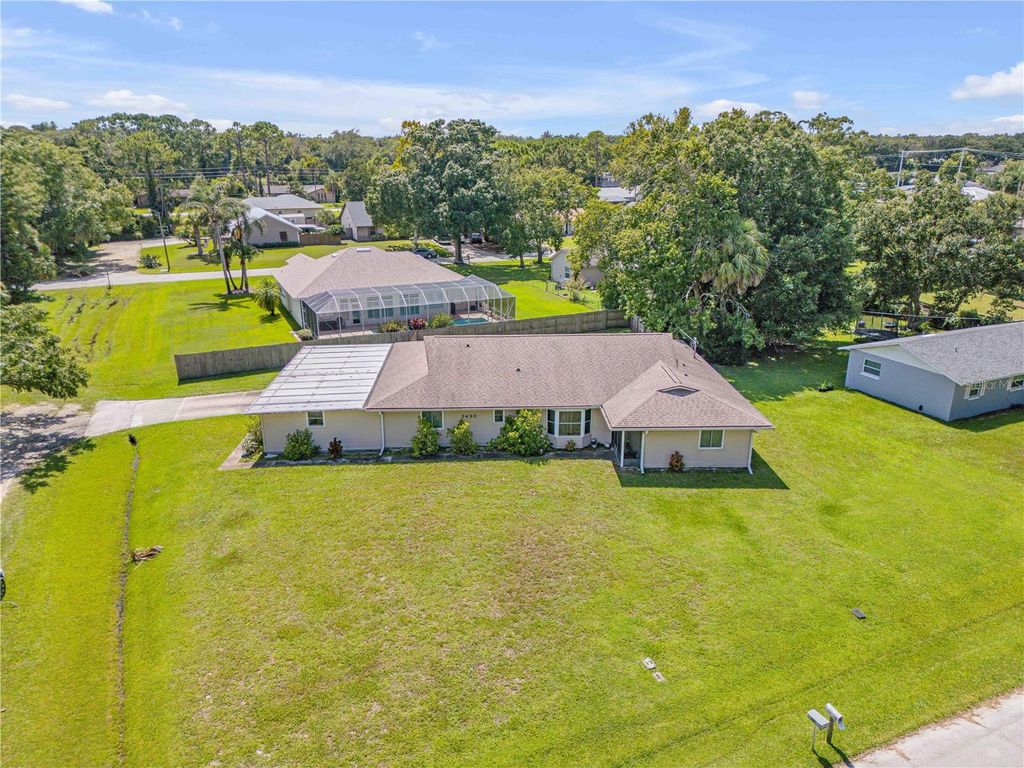 Photo of 2430 Unity Tree Drive, Edgewater, FL 32141 (MLS # NS1087250)