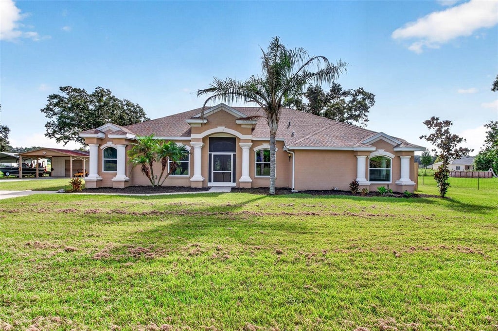Photo of 3412 Wolfe Road, Zephyrhills, FL 33541 (MLS # TB8550797)