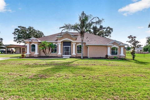 Photo of 3412 Wolfe Road, Zephyrhills, FL 33541 (MLS # TB8550797)