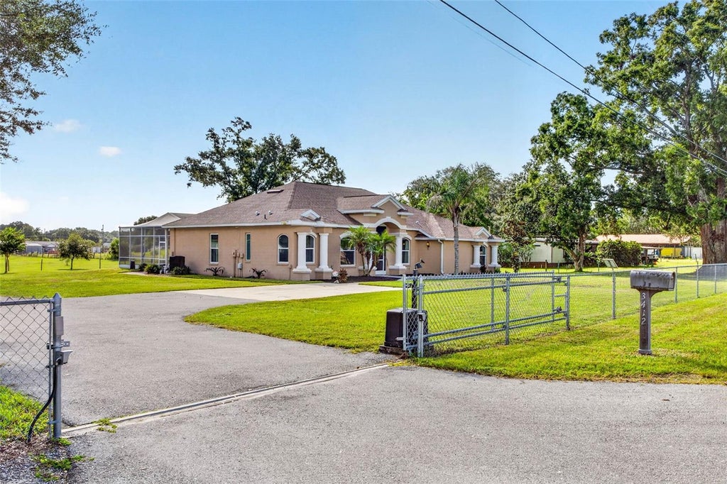 Photo of 3412 Wolfe Road, Zephyrhills, FL 33541 (MLS # TB8550797)
