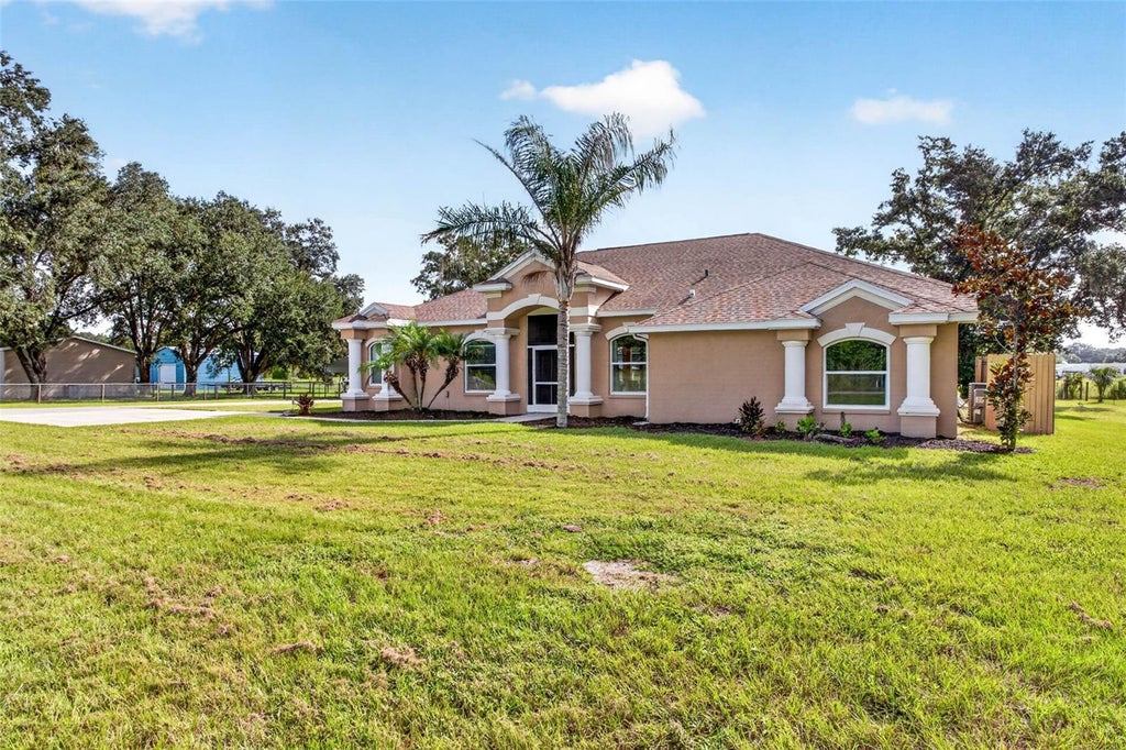 Photo of 3412 Wolfe Road, Zephyrhills, FL 33541 (MLS # TB8550797)