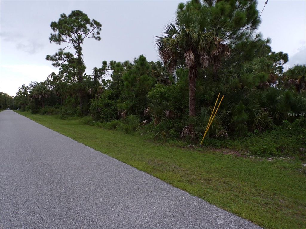 Photo of 424 Mcdill Drive, Port Charlotte, FL 33953 (MLS # C7513979)