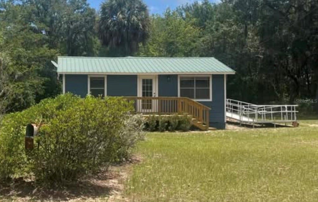 Photo of 148 Willis Road, Interlachen, FL 32148 (MLS # FC322327)
