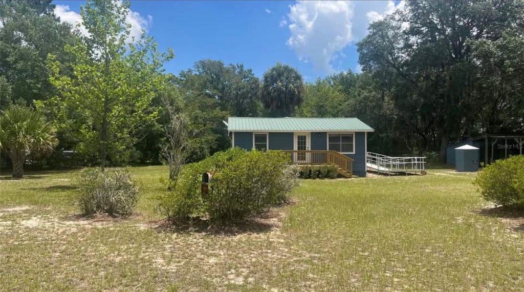 Photo of 148 Willis Road, Interlachen, FL 32148 (MLS # FC322327)