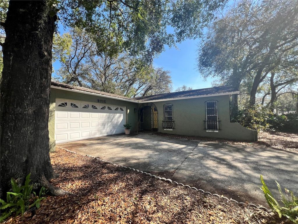 Photo of 9715 Hidden Oaks Circle, Tampa, FL 33612 (MLS # TB8469457)