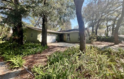 Photo of 9715 Hidden Oaks Circle, Tampa, FL 33612 (MLS # TB8469457)