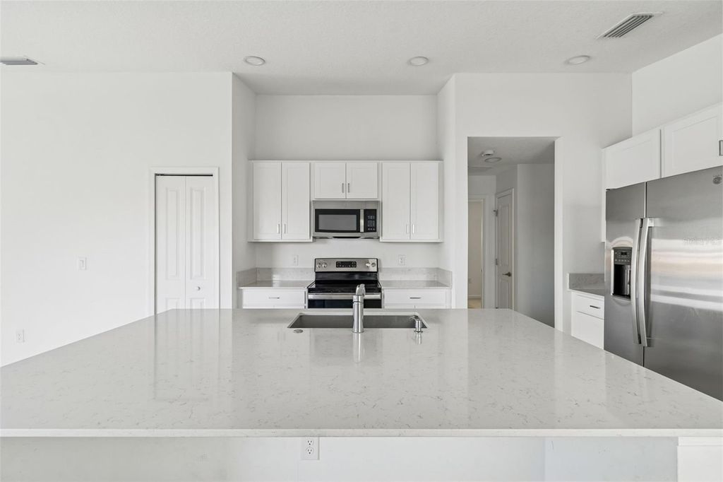 Photo of 702 Papillon Street SW, Palm Bay, FL 32908 (MLS # TB8443137)