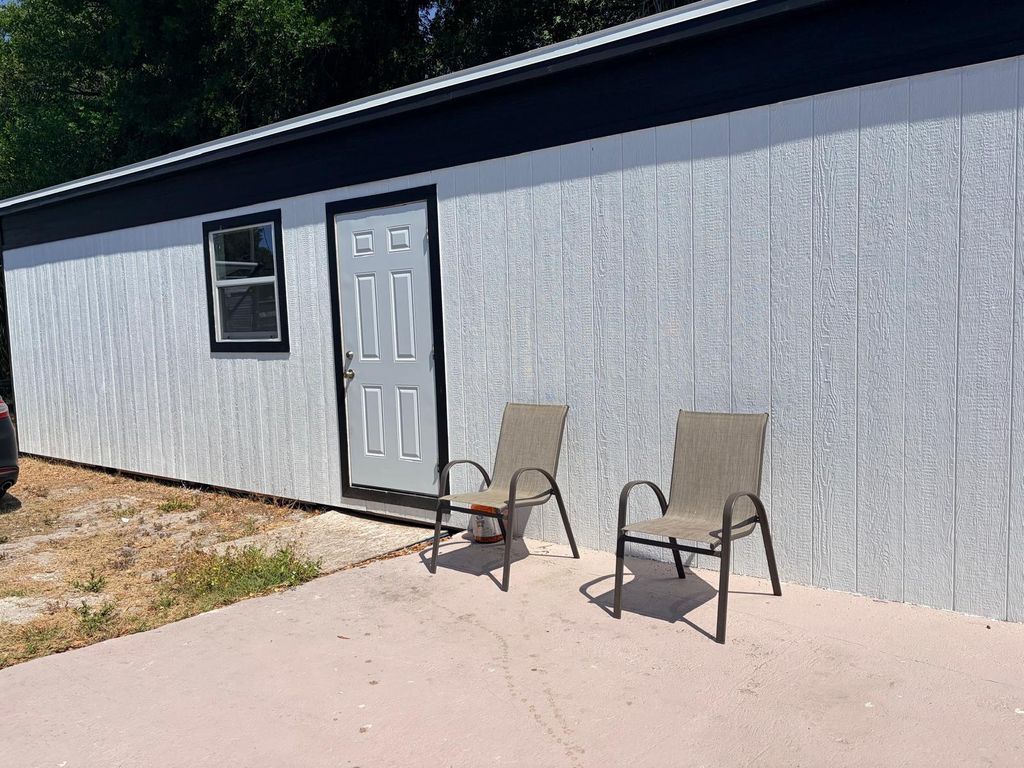 Photo of 1304 Windsor Way, Tampa, FL 33619 (MLS # TB8503414)