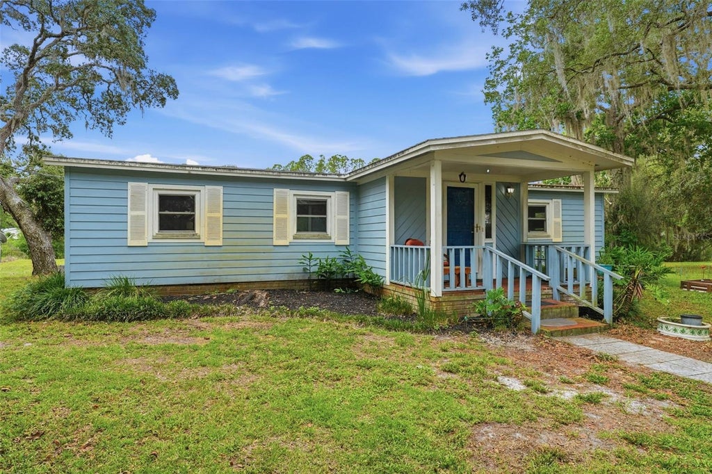 Photo of 9380 N Cedar Cove Road, Dunnellon, FL 34434 (MLS # OM726309)