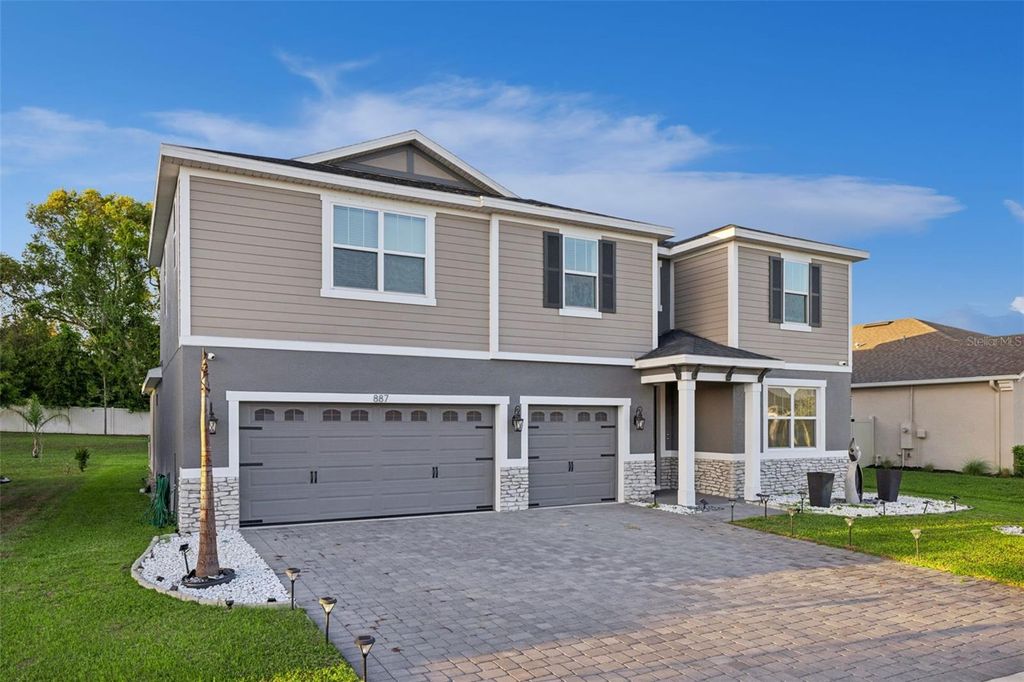 Photo of 887 Asterfield Lane, Deland, FL 32720 (MLS # O6399668)