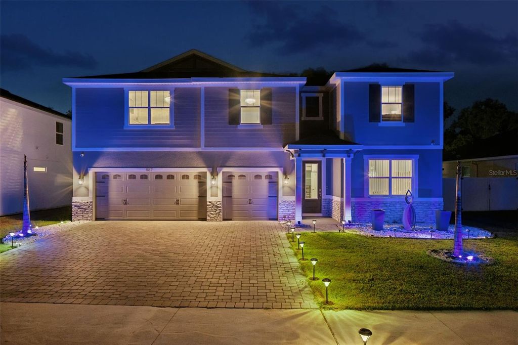 Photo of 887 Asterfield Lane, Deland, FL 32720 (MLS # O6399668)