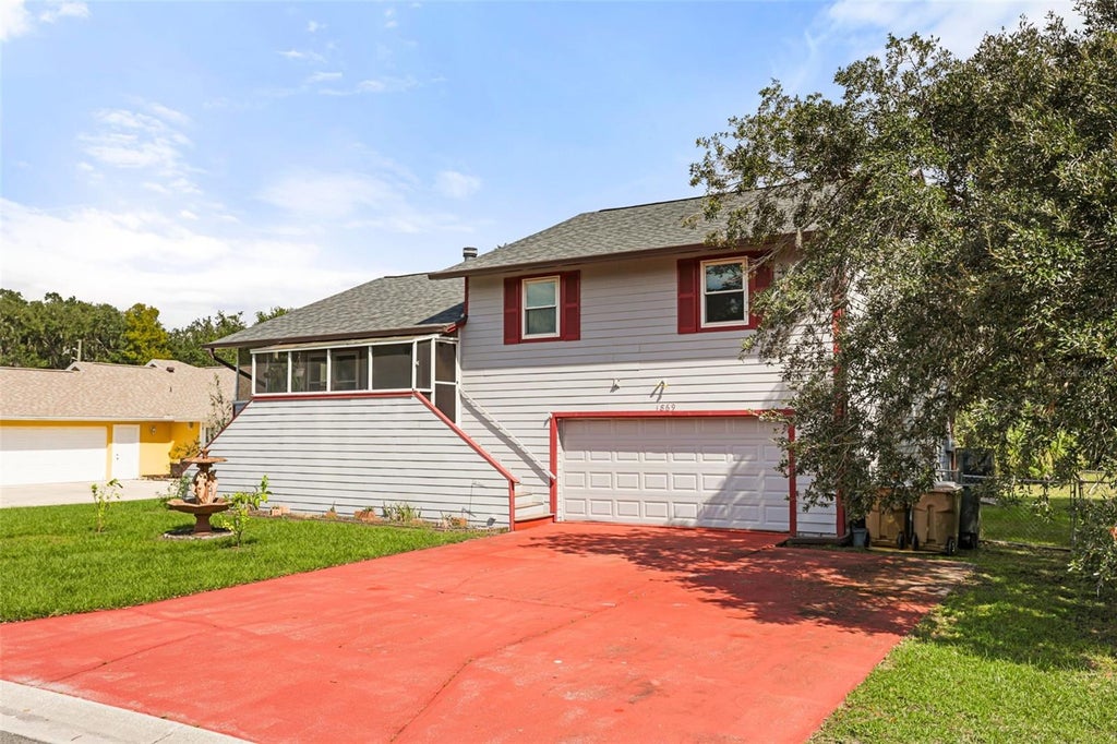 Photo of 1869 Kings Point Boulevard, Kissimmee, FL 34744 (MLS # O6450744)