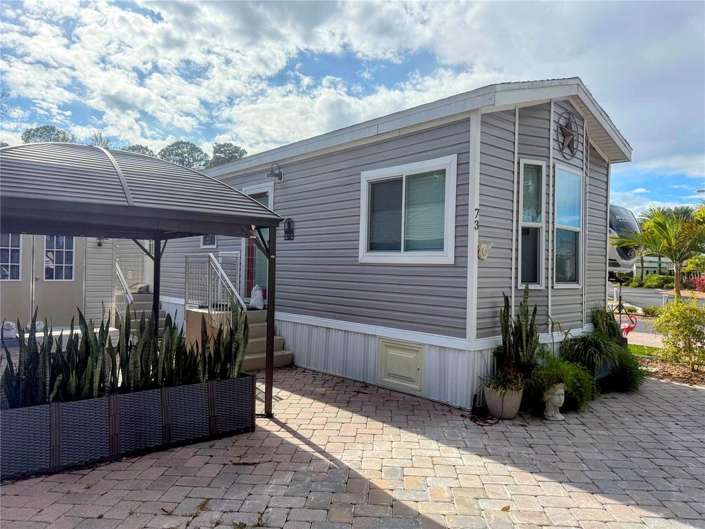 Photo of 16540 Sunshine Avenue, Clermont, FL 34714 (MLS # O6373325)