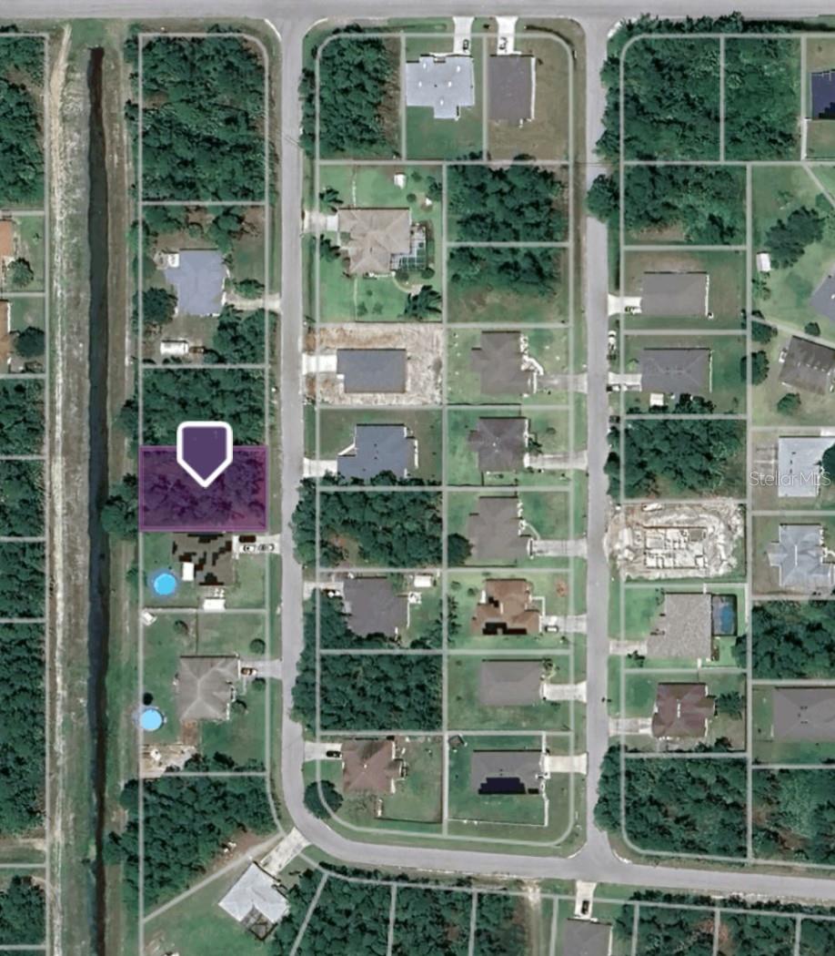Build your dream home on this spacious 0.23-acre residential lot in Palm Bay. Located in the Port Malabar Unit 31 subdivision, the property offers plenty of room for a custom design with space for outdoor living. The lot sits on a residential street with convenient access to main roadways, shopping, dining, and schools!