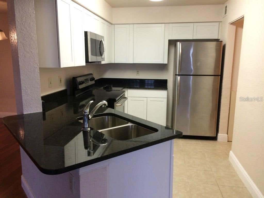 Photo of 2550 N Alafaya Trail #7100, Orlando, FL 32826 (MLS # O6434205)