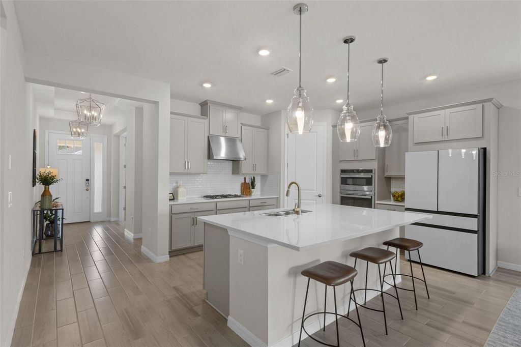 Photo of 33555 Mainstay Lane, Wesley Chapel, FL 33543 (MLS # TB8483311)