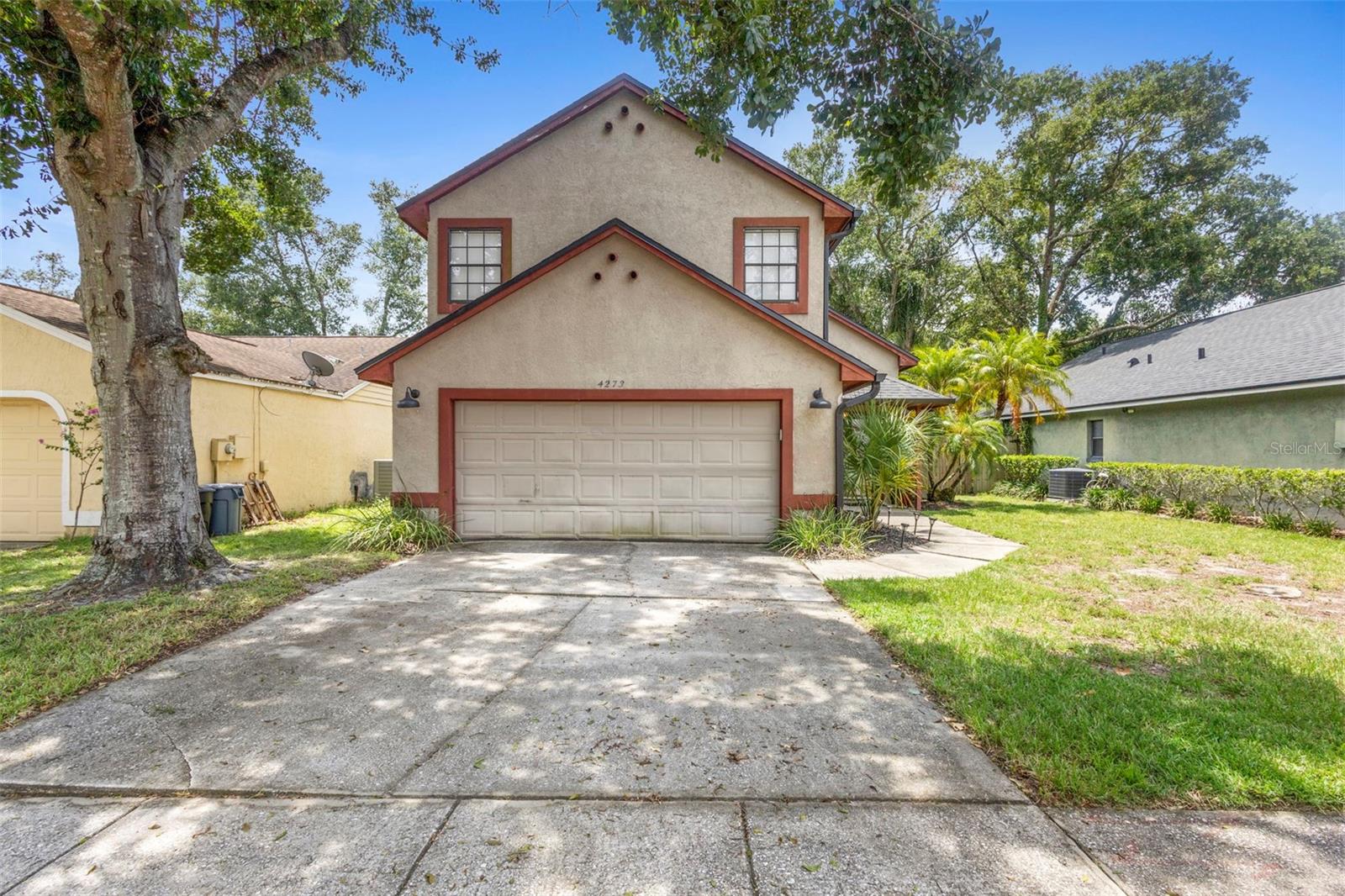 Welcome to this beautifully maintained 3-bedroom, 2.5-bathroom pool home with a 2-car garage, nestled in the desirable Deer Run community. Featuring a newer roof (2021) and a brand-new water heater (2025), this home offers both comfort and peace of mind. Upon entering, you’ll be greeted by a spacious family room with soaring vaulted ceilings that create an open and inviting atmosphere. The kitchen and dining area flow seamlessly together, complete with a breakfast bar and sliding glass doors that open to the screened-in lanai and in-ground pool—perfect for entertaining. All kitchen appliances are newer, and just off the kitchen, you'll find a convenient half bathroom and an indoor laundry room. Upstairs, you'll discover three bedrooms and two full bathrooms, including a newly remodeled primary suite with updated tile in the shower and around the soaking tub. Enjoy outdoor living with a fully fenced backyard and a screened pool area ideal for gatherings or relaxation. Located in a prime spot with access to top-rated Seminole County schools, a friendly community, and an unbeatable location—this home is a must-see. Call today to schedule your private showing!