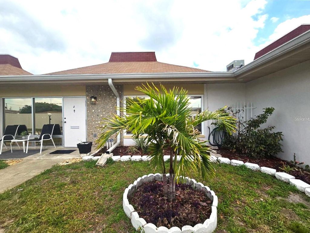 Photo of 4345 Tahitian Gardens Circle #J, Holiday, FL 34691 (MLS # TB8455729)