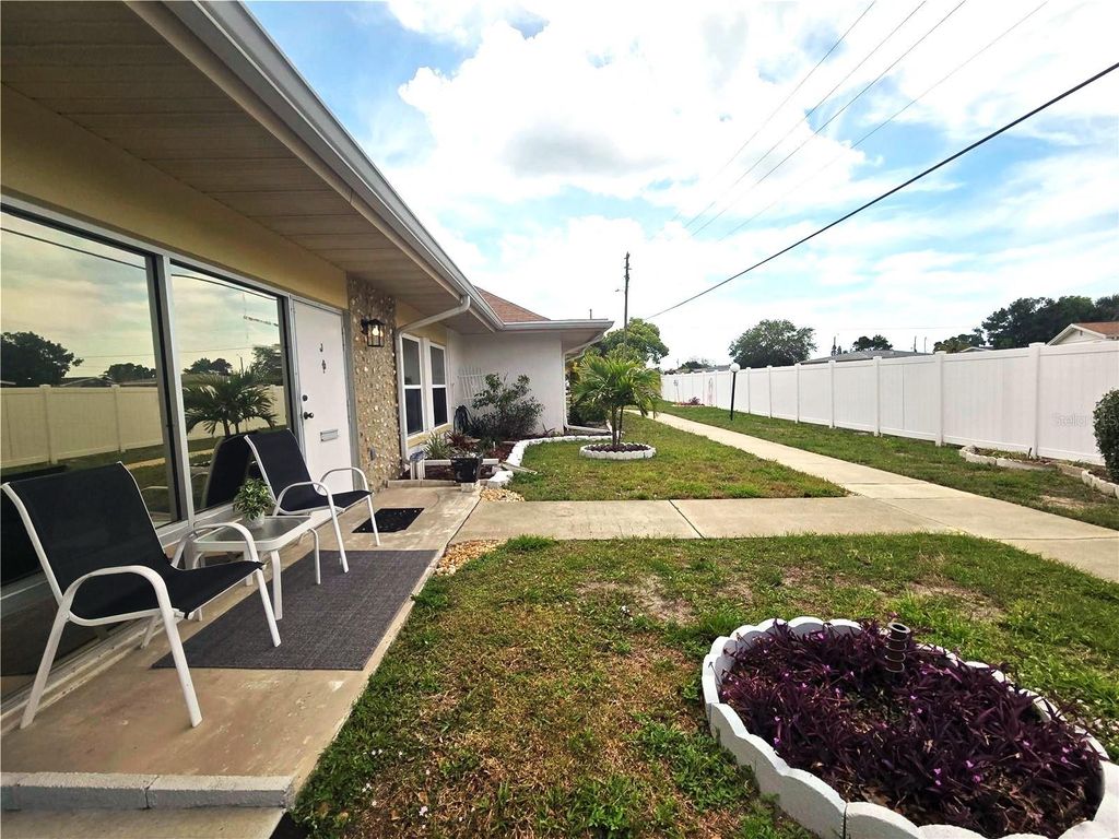 Photo of 4345 Tahitian Gardens Circle #J, Holiday, FL 34691 (MLS # TB8455729)